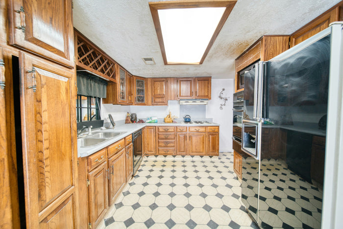 Shaker doors, new handles, same layout — before