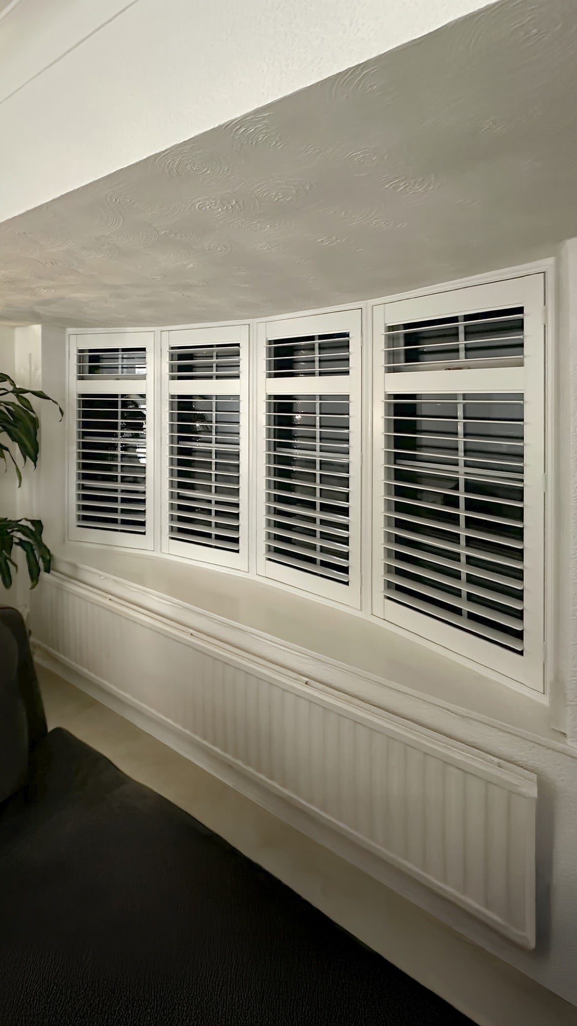 Classic collection shutters on a bay window in a dining area