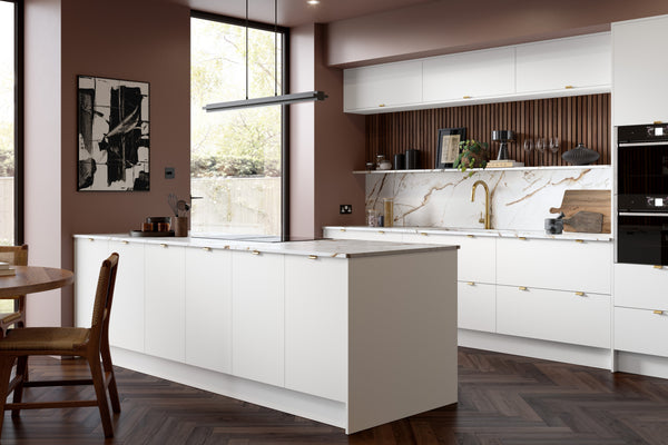 Ora Supermatt Polar White handleless kitchen doors in a fitted kitchen